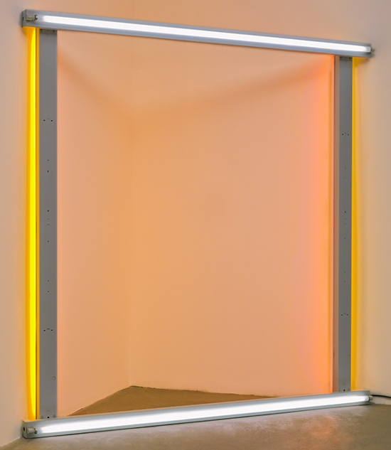 Fluorescent light sculpture by Dan Flavin called untitled (to the “innovator” of Wheeling Peachblow) (1968). Orange fluorescent lights on a metal frame casting orange/peach-colored light into a corner of a room.