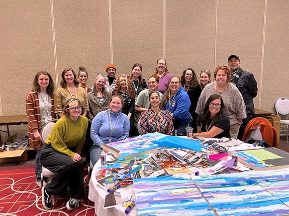 Art educators, Alice Mizrachi, and Peyton Scott Russell at the National Art Education Association 2024 Convention mural workshop.